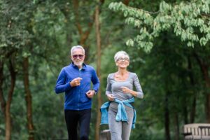 older couple walking outside